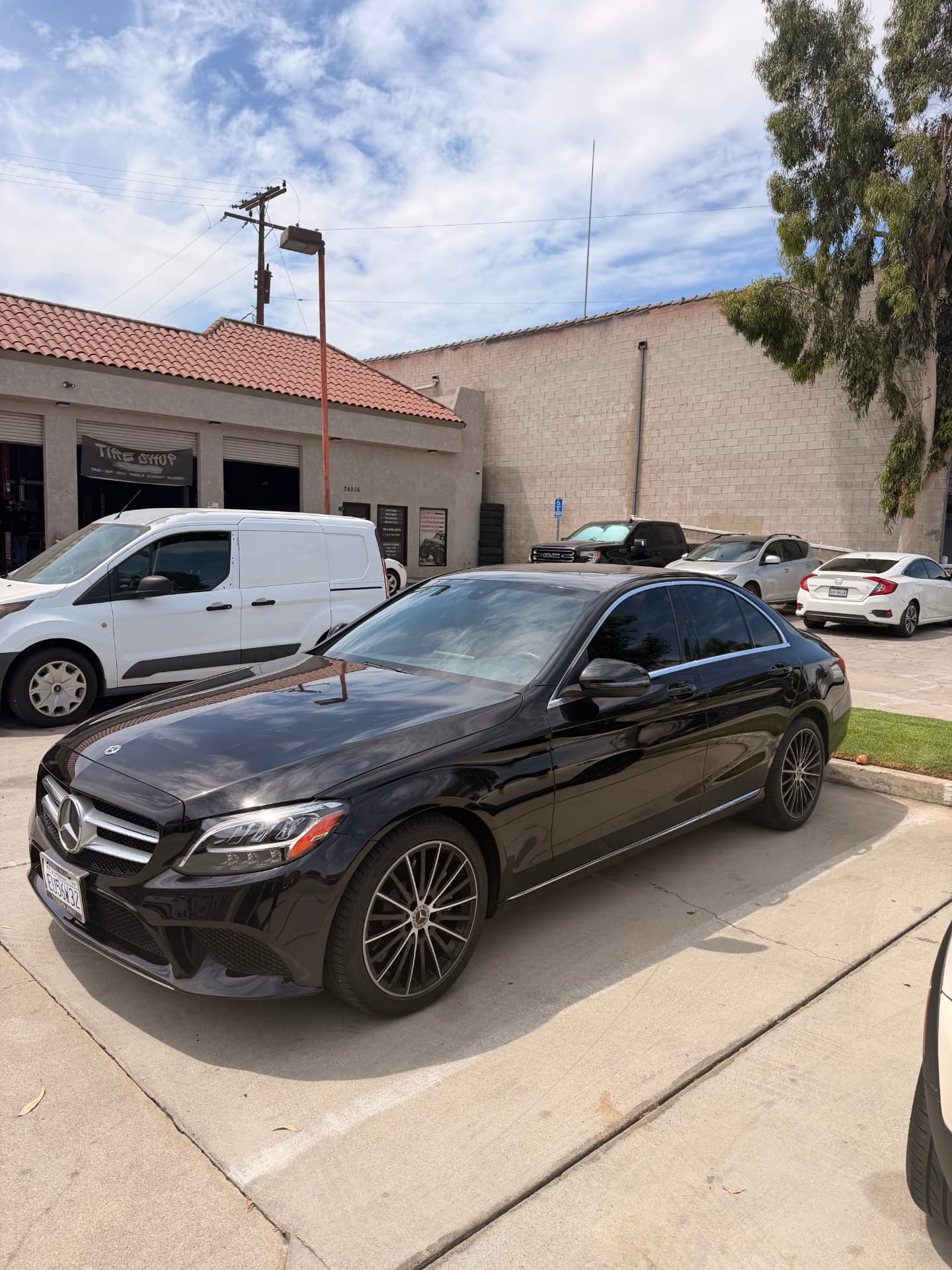 Black Mercedes-Benz C300 with fresh window tint